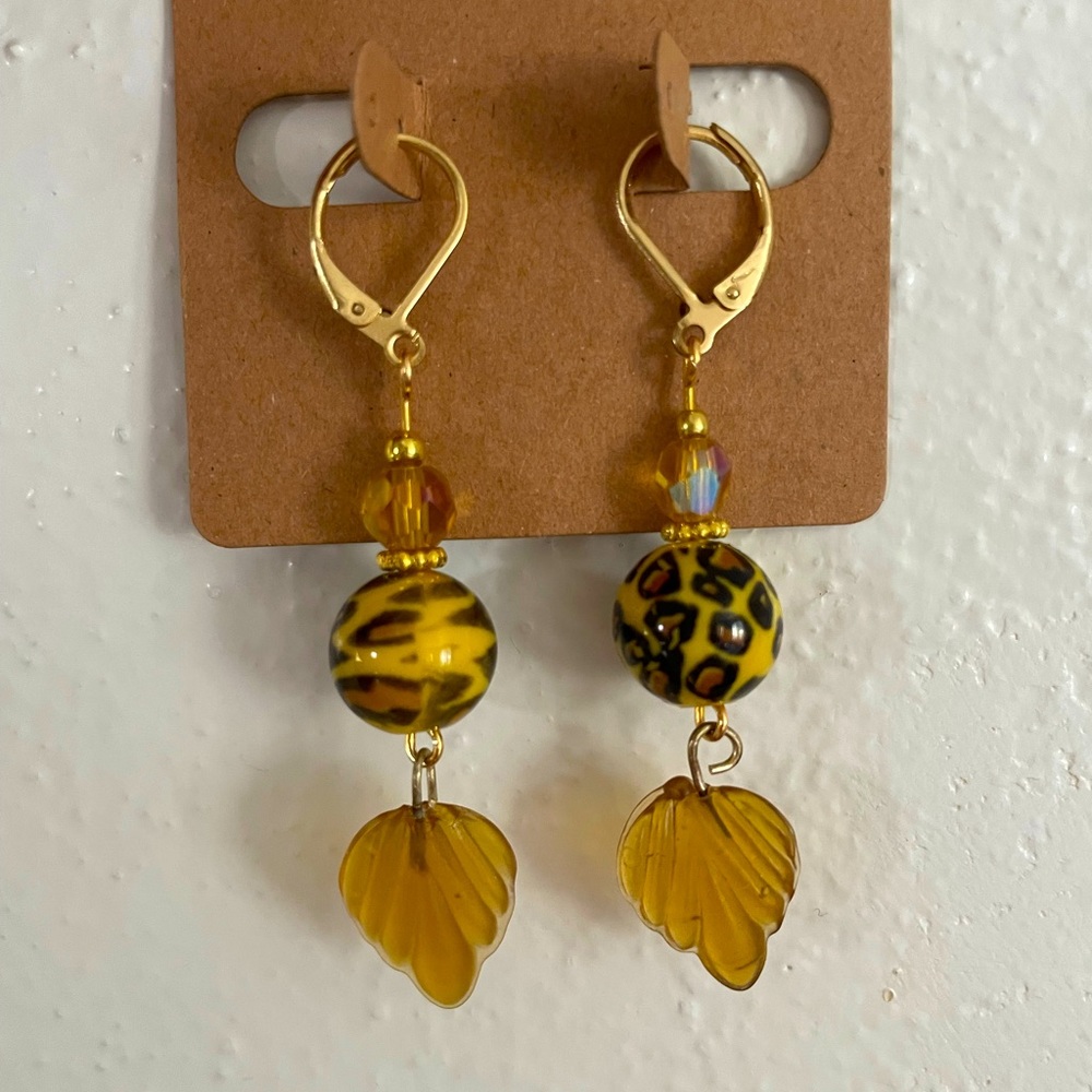New handmade earrings, cheetah print, glass Aurora borealis beads.